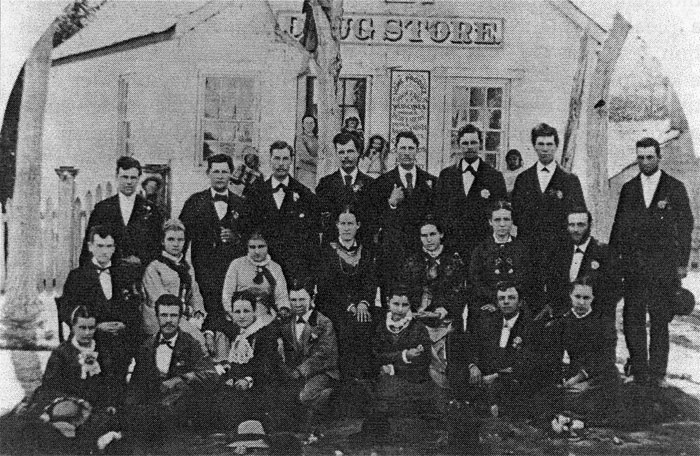 Fig. 6. Members of Gardeners’ (or Union?) Club in front of
				J.E. Johnson’s Drug Store in 1870s.